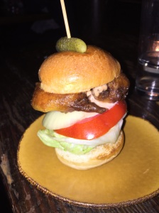 An oyster slider so tall it had to be turned on its side in order to get a good bite at Sweetwater Social